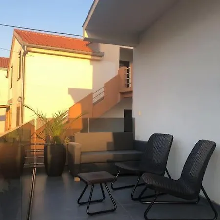 In Apartment *